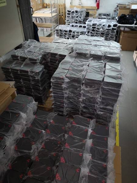 Shipping of VOTwear Boxes from Manufacturers to buyers. Boxes in storagespace by the thousands